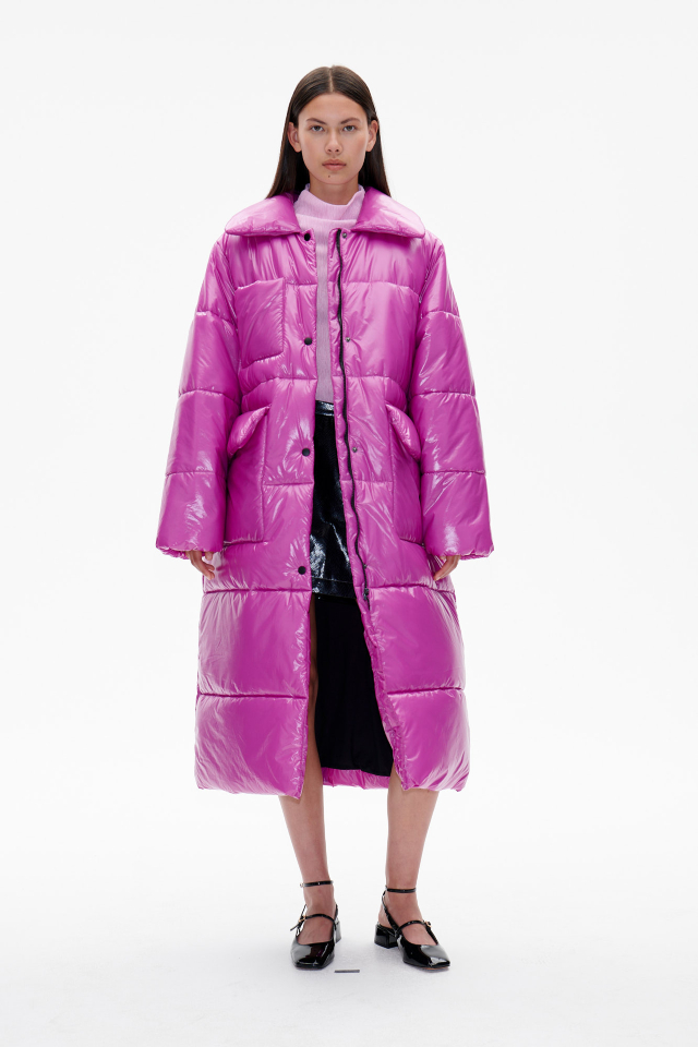 Delaware Coat Radian Orchid This longline, puffy coat features both zip and button closures - model image