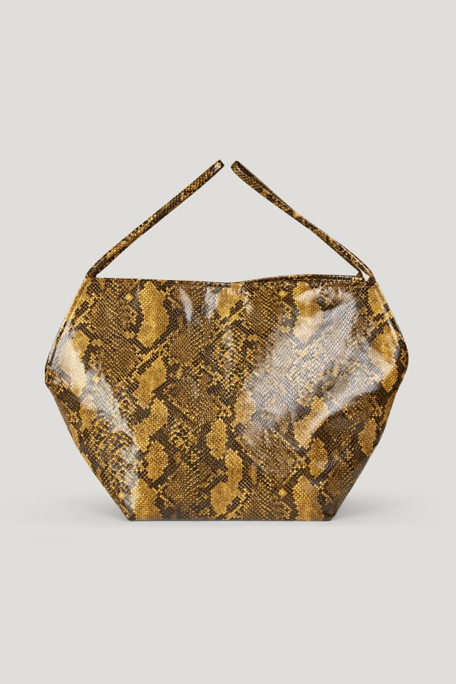 Kamilla Bag Yellow Snake This soft tote bag features handles on both sides and a magnetic closure in the middle - front image