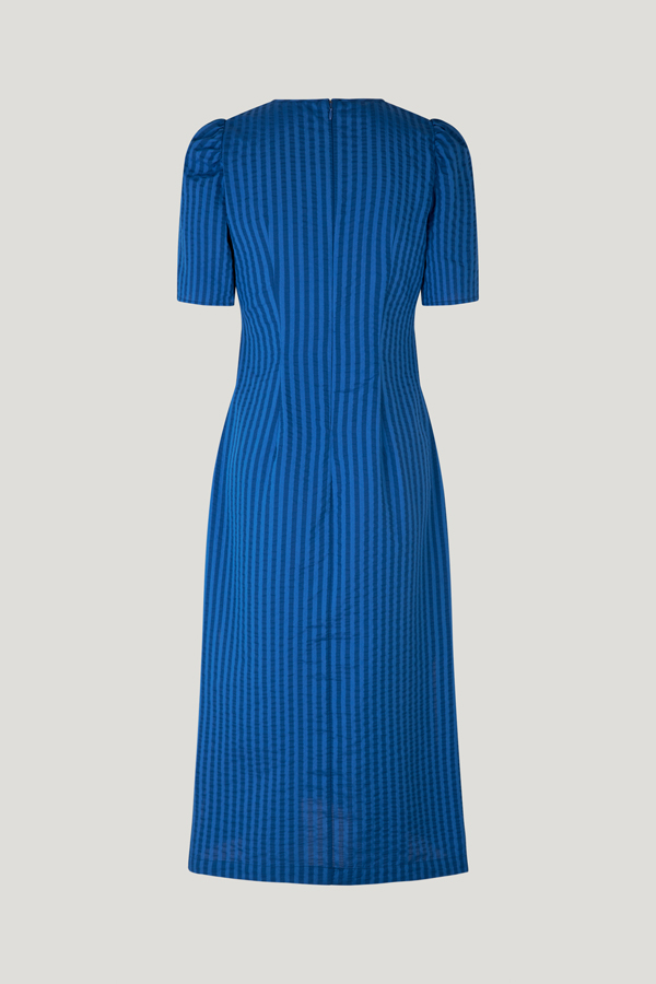 Aranza Dress True Palace Blue An A-line, mid-calf length dress with a V-neck and ruching at the chest - back image