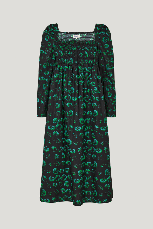 Amayra Dress Green Distorted Pansy This midi-length dress features an empire waist, stretchy smocking across the chest and back, and a square neckline - front image