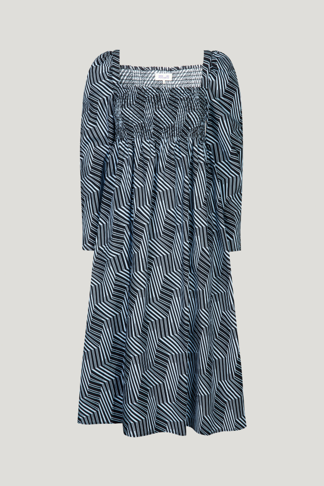 Amayra Dress Blue Zebra This midi-length dress features an empire waist, stretchy smocking across the chest and back, and a square neckline - front image