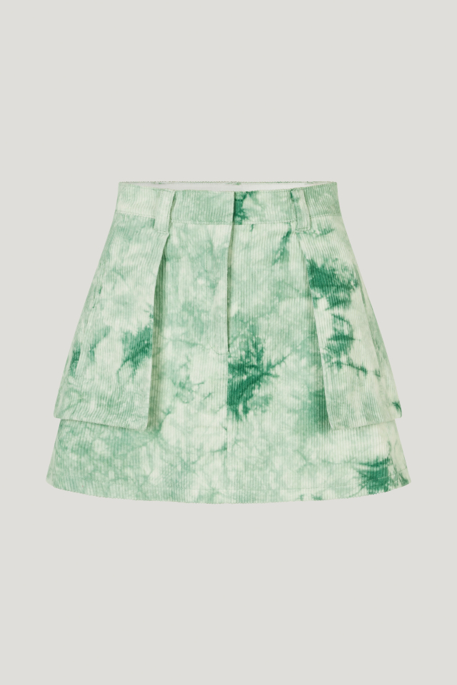Sakura Skirt Green Ice Velvet This corduroy miniskirt features a zip fly with hook closure, and flaps with pockets at the side for a layered look - front image