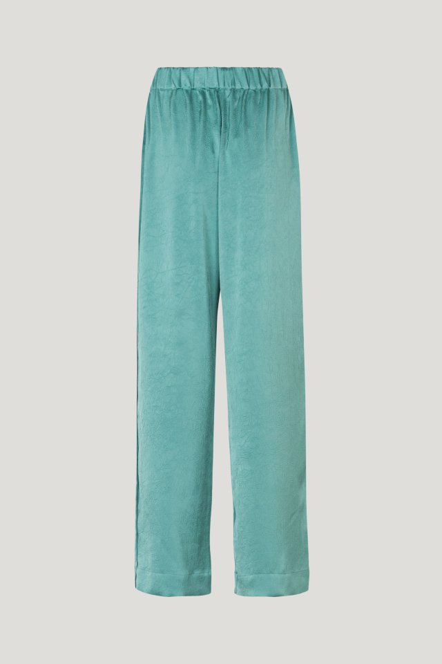 Narine Trousers Trellis These fluid, wide-leg trousers feature an elasticated waistband, side pockets, and raised seams down the sides - back image