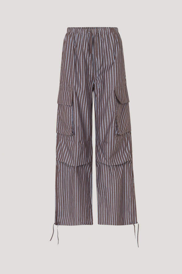Nasreen Trousers Brown Margot Stripe These low-rise trousers feature wide legs, an elasticated waistband with a drawstring tie, and drawstring ties at the ankles - front image