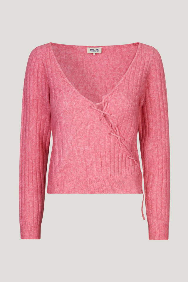 Chelsie Sweater Chateau Rose This soft knit jumepr features a deep V-neck, ribbed pattern, and an asymmetrical lace-up tie in the front - front image