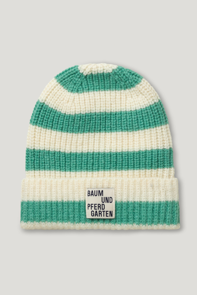 Lenora Hat Creme Green Breton This thick, ribbed knit beanie features a logo tag at the front - front image