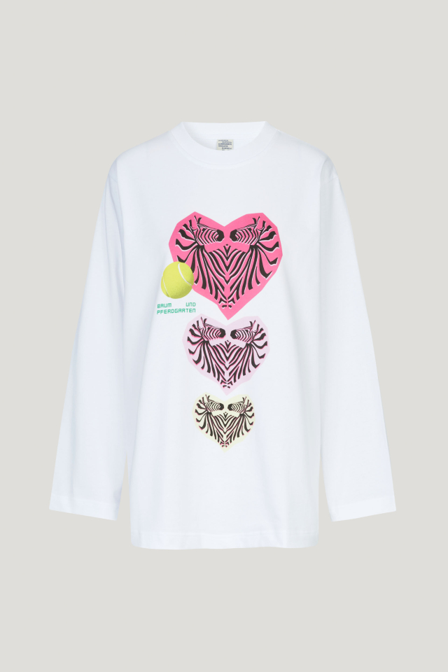Jeevana Top Lucent Zebra Hearts This soft pullover top features wide sleeves - front image