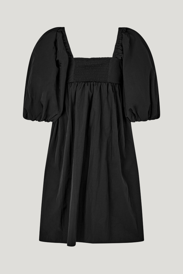 Aditi Dress black This babydoll-style nylon dress feaures a zip closure at the side, elasticated shoulders and sleeves, and pockets at the sides - back image