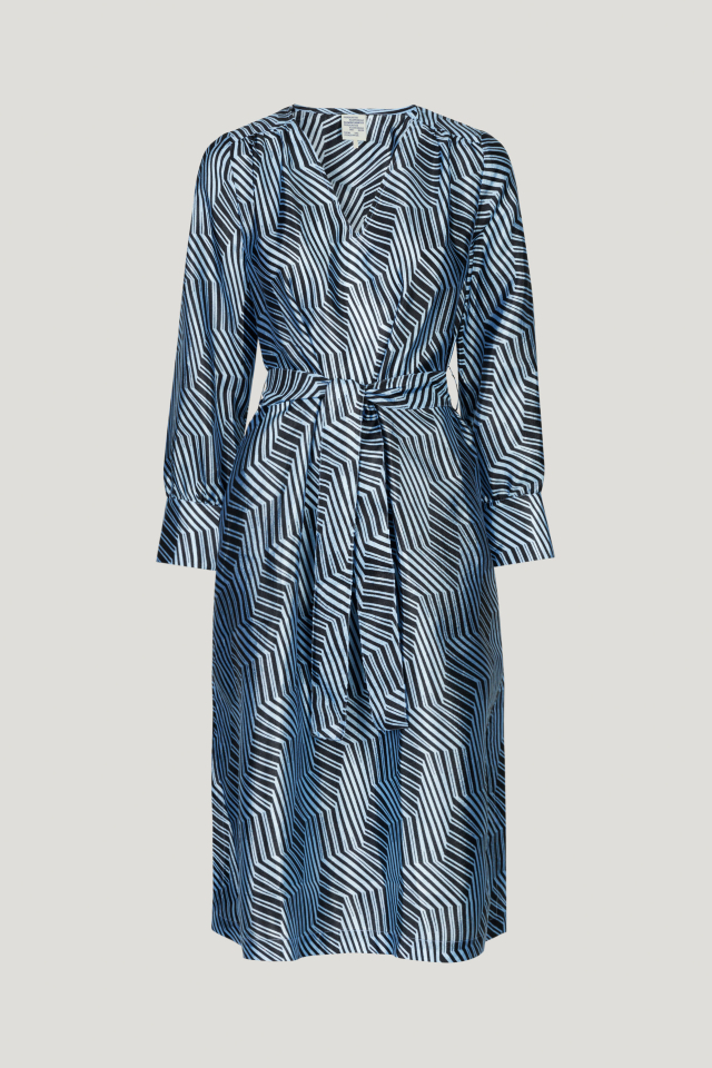 Aradina Dress Blue Zebra This midi-length dress has a removable tie at the waist, side pockets, V-neck, and cuffed sleeves - front image