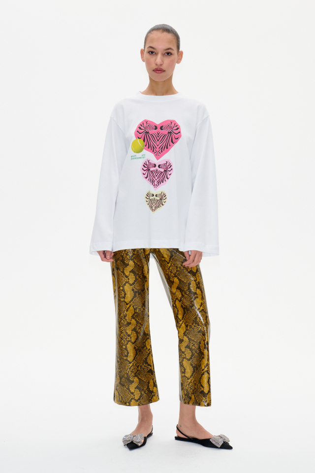 Jeevana Top Lucent Zebra Hearts This soft pullover top features wide sleeves - model image