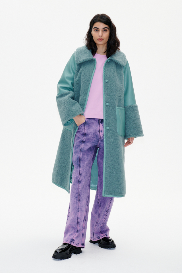 Dea Coat Trellis This longline coat features shearling-style detailing throughout, button closures in the front, and patch pockets - model image