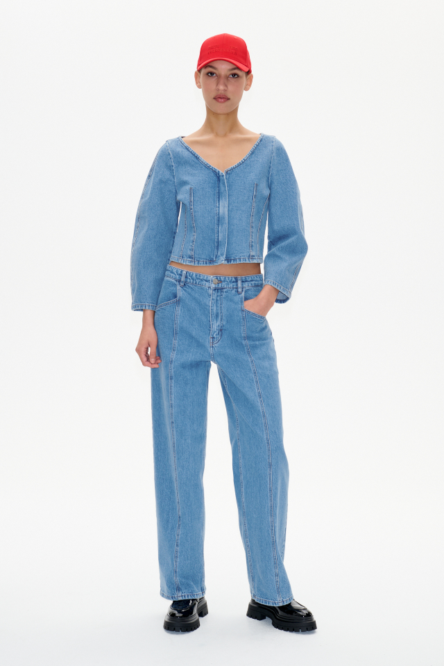 Nara Jeans Blue Vintage Denim These high-rise jeans feature a straight leg, zip fly with button closure, and four pockets - model image
