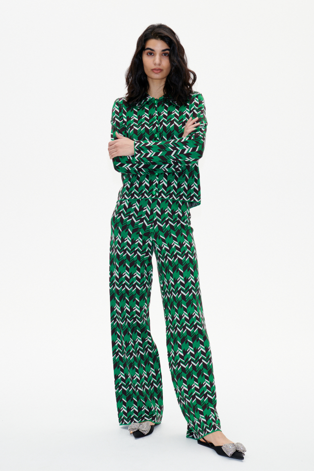 Cabery Trousers Green Geometric These stretchy, wide-leg knit trousers feature an elasticated waist - model image