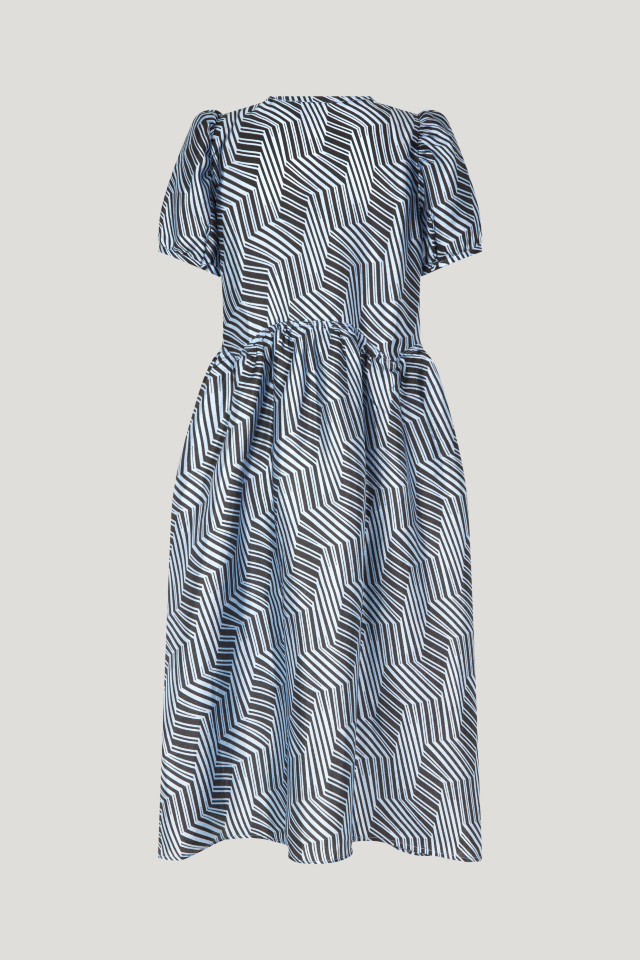 Artemis Dress Blue Zebra This midi-length dress features a button closure with keyhole opening at the front, pockets at the sides, slight puffing at the skirt, and a dipped waistline - back image